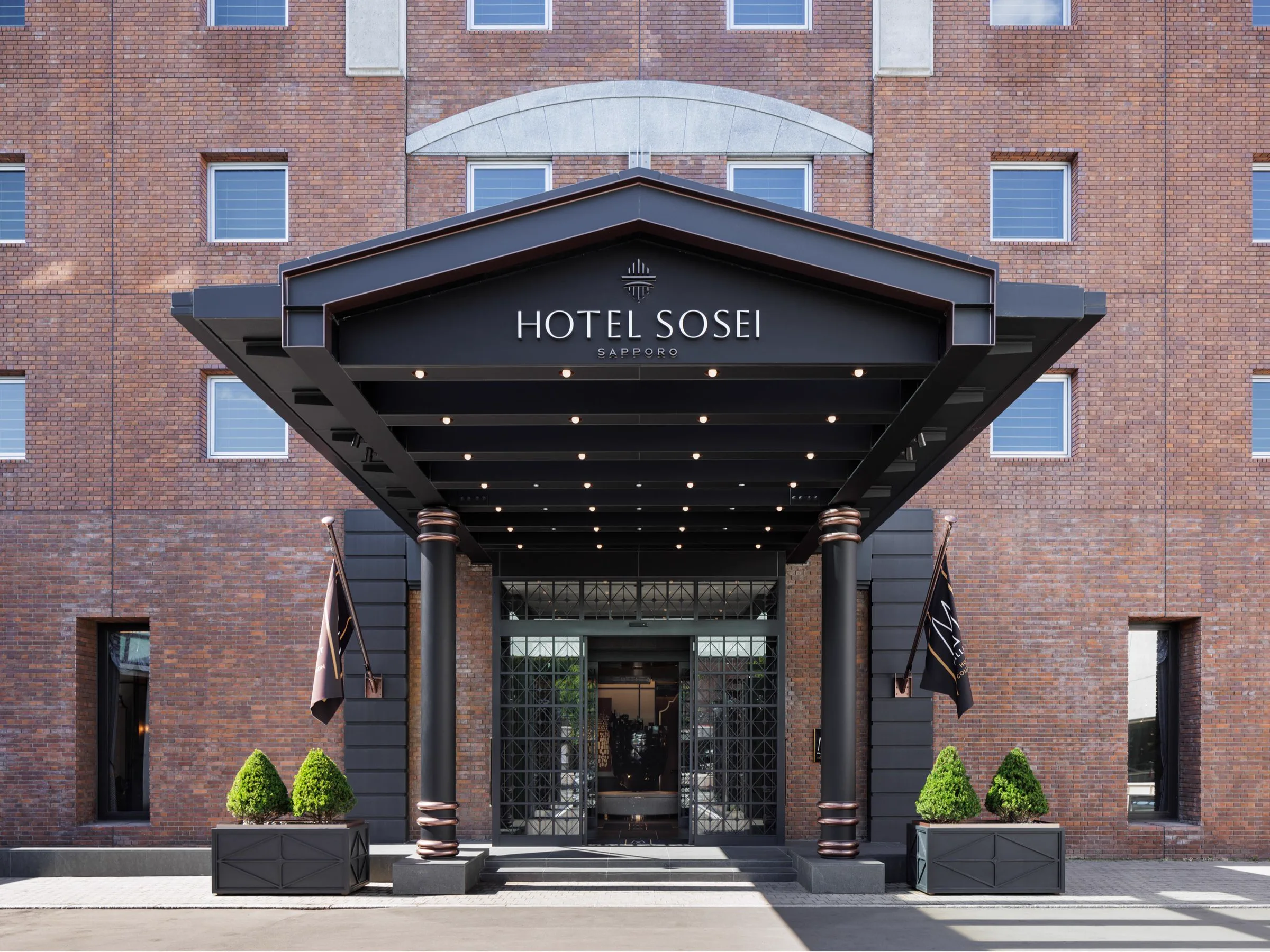 Hotel Sosei Sapporo 입구: 렌터카 높이에 따라 기계식과 전면 주차 비용이 달라질 수 있음